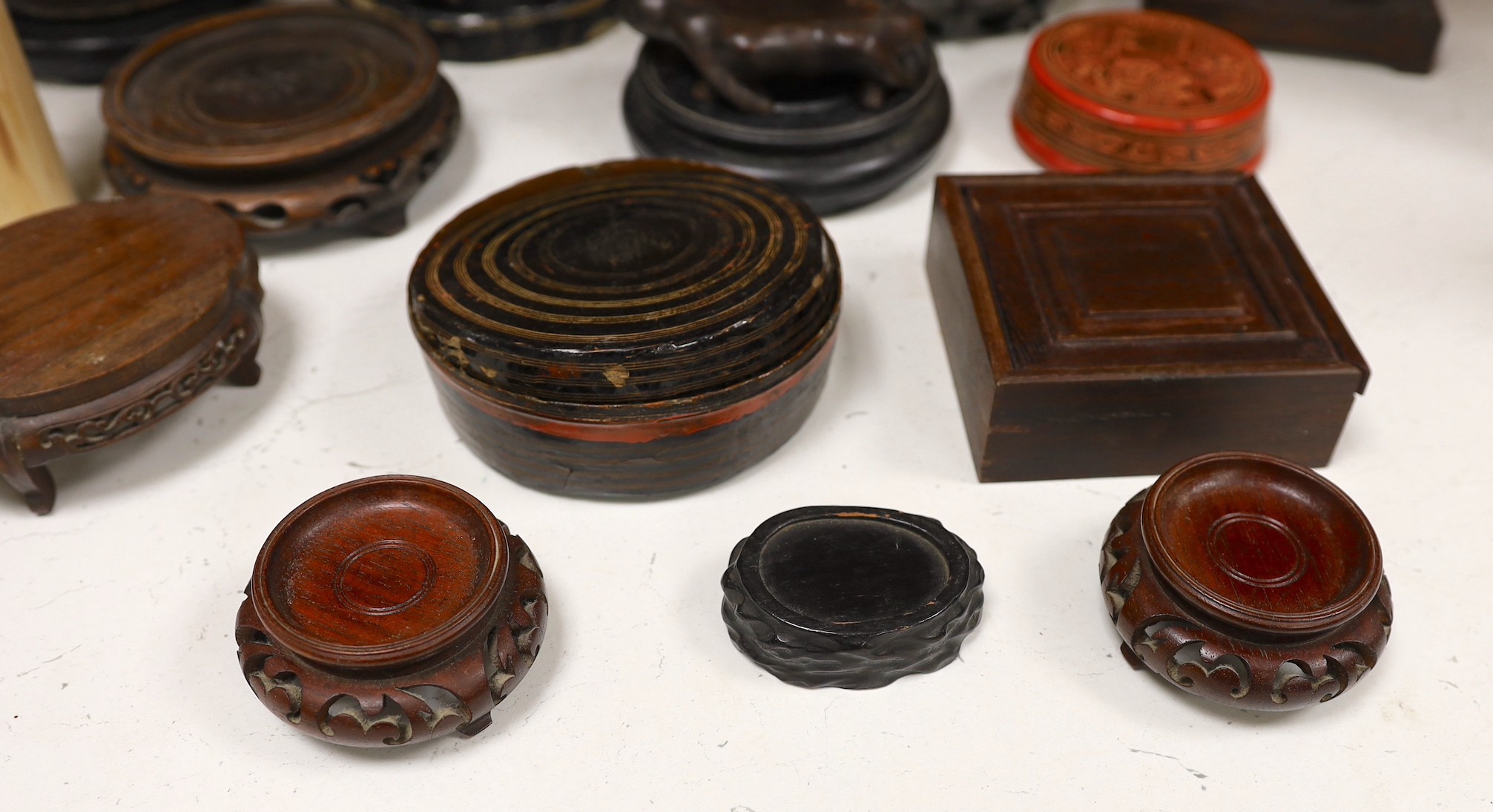 A group of Chinese and Oriental wood stands and a box